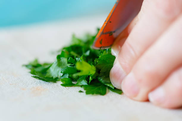 istock parsley on a wooden cutting board 1124416531