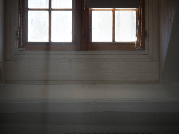 istock Shot of a window with light coming in 1124420256