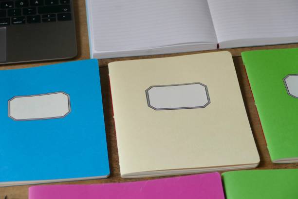 istock Colorful workbooks and laptop from above 1124423144