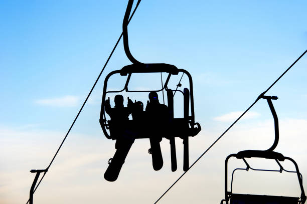 istock people on chairlift with skis 1124423185