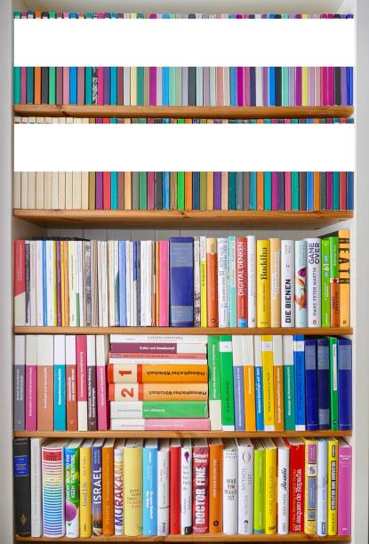 istock Library shelves and two rows with colorful books in upper part, copy space 1124423270