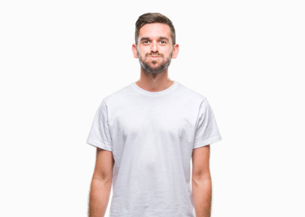 istock Young handsome man over isolated background puffing cheeks with funny face. Mouth inflated with air, crazy expression. 1124426304