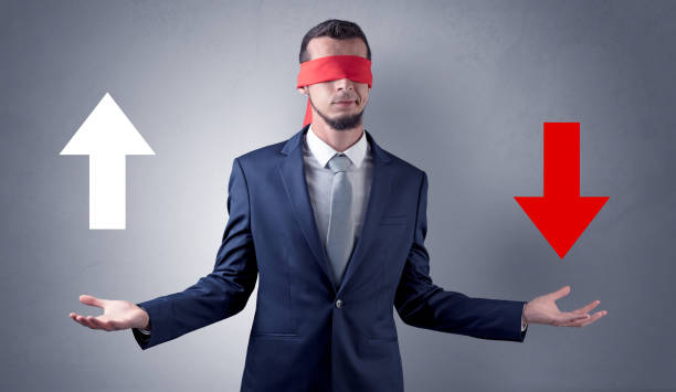 istock Covered eye businessman choosing direction 1124427324