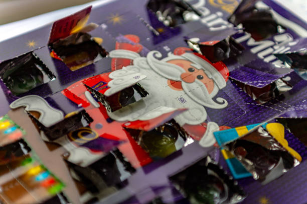 Christmas Advent Calendar Christmas Advent Calendar with all doors open on Christmas Day. The calendar is a Cadbury's Dairy Milk calendar in a real life situation in Huntingdon, UK. cambridgeshire photos stock pictures, royalty-free photos & images