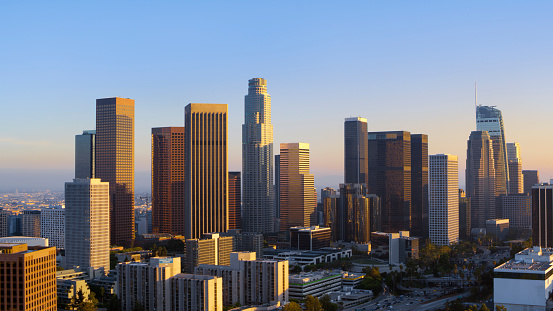 Aerial view of crowded cityscape with modern skyline, Los Angeles, California, USA.