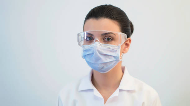 istock Young attractive female scientist researching in laboratory 1124432356