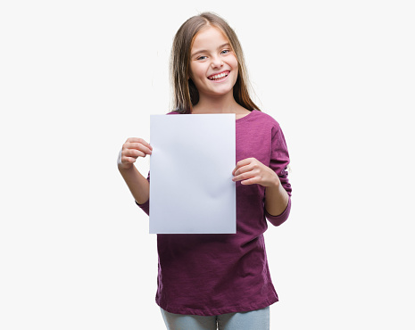 Young beautiful girl holding blank sheet paper over isolated background with a happy face standing and smiling with a confident smile showing teeth