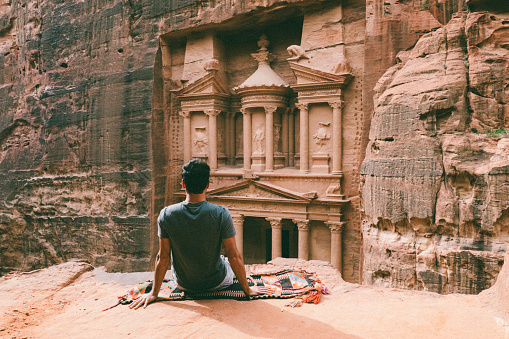 Young man hiking in Petra, Jordan