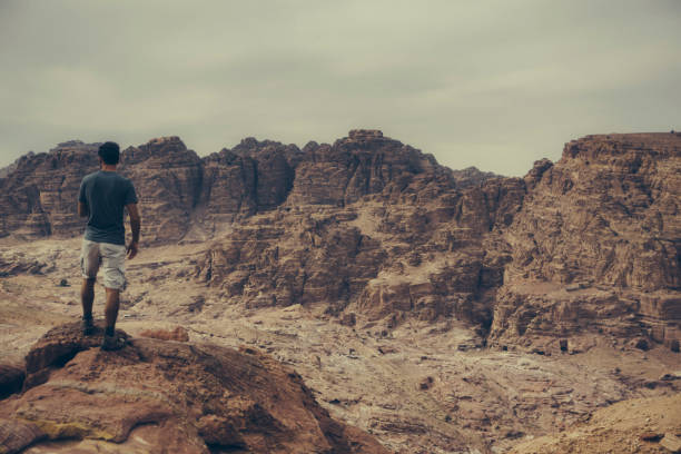 istock Young man hiking in Jordan 1124441352