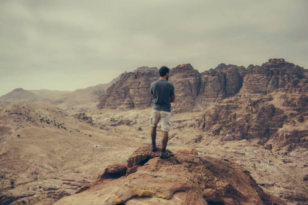 istock Young man hiking in Jordan 1124441406