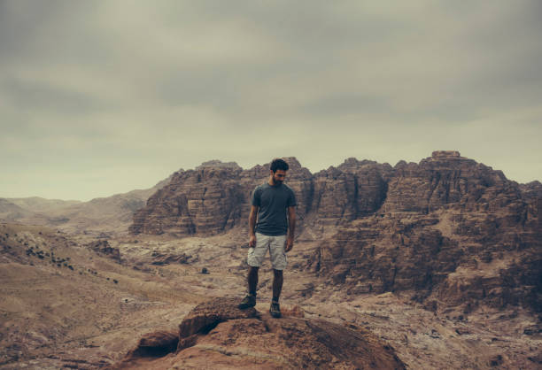 istock Young man hiking in Jordan 1124441689