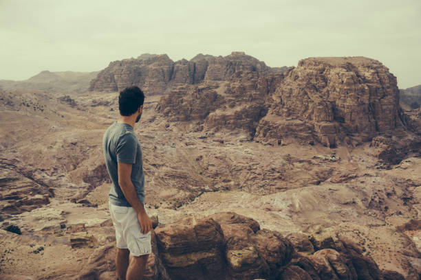 istock Young man hiking in Jordan 1124441693