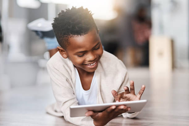 learning through playing - schoolboy relaxation happiness confidence imagens e fotografias de stock