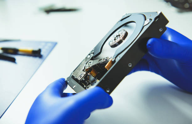 istock Close up of male hands with HHD at workplace 1124443353