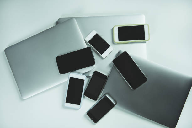 istock Flat lay of different digital gadgets isolated on white background 1124443516