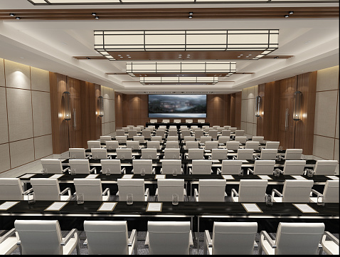 Neatly arranged conference room tables and chairs