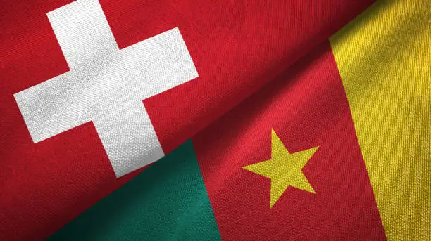 Cameroon and Switzerland flags together textile cloth, fabric texture