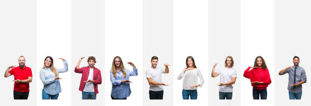 istock Collage of different ethnics young people over white stripes isolated background gesturing with hands showing big and large size sign, measure symbol. Smiling looking at the camera. Measuring concept. 1124447317