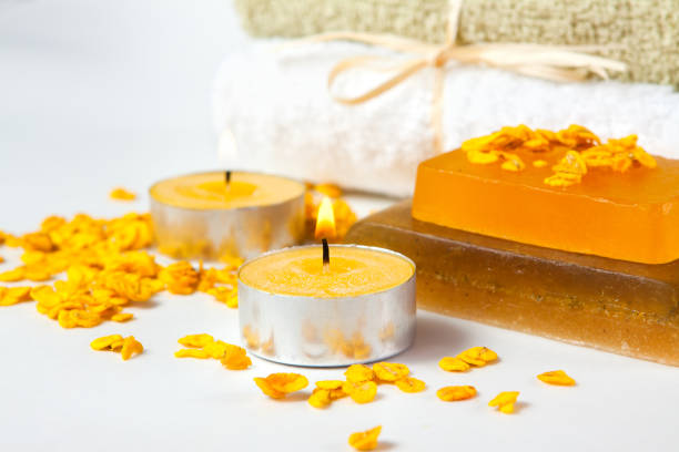 istock pieces of soap, candles and towels on a white 1124448228