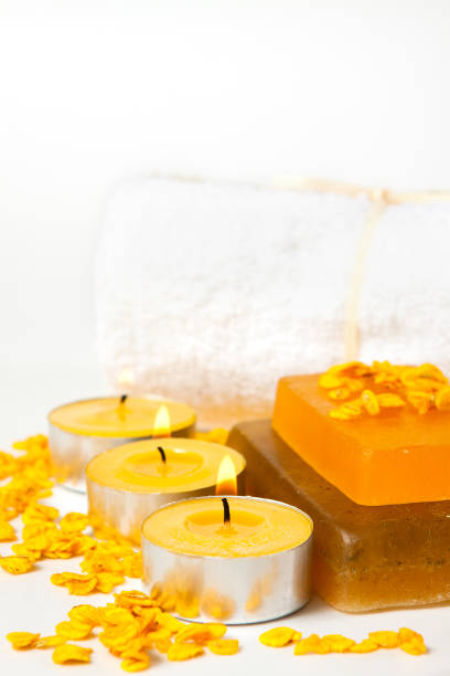 istock handmade soap, candles and towels on a white background, vertical frame 1124448383