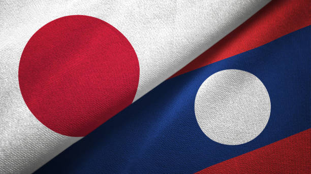 istock Laos and Japan two flags together textile cloth, fabric texture 1124449785