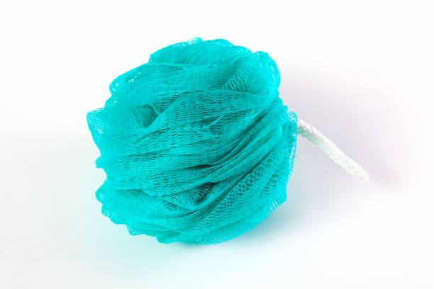 istock fluffy blue washcloth isolated on white background 1124449868