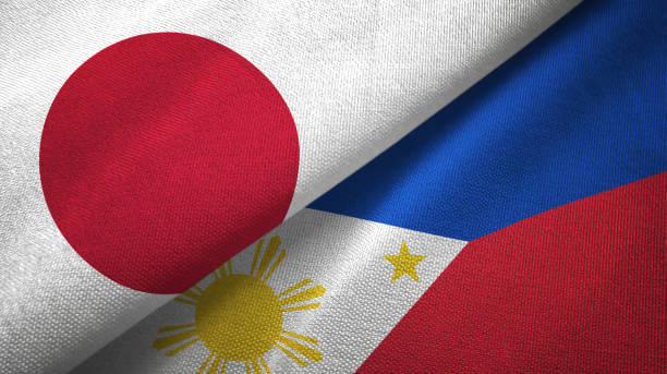 philippines and japan two flags together textile cloth, fabric texture - japanese flag flag japan textile imagens e fotografias de stock