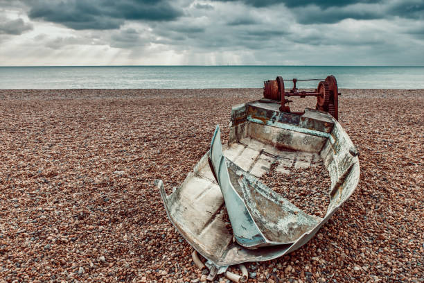 istock urban eAbandoned boat on Brighton Beach, stormy weather 1124452454