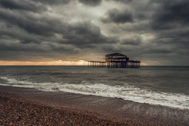 istock Brighton Winter seascape, stormy sky over old West Pier 1124452512