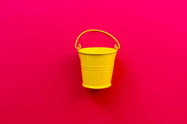 istock empty toy bucket on paper background 1124453909