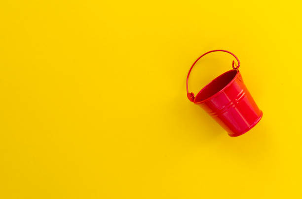 empty toy bucket on paper background