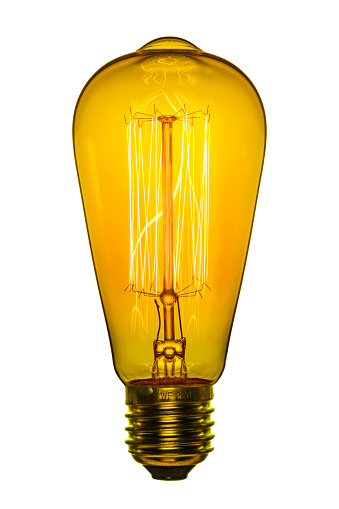 Retro light bulb, Edison style. Isolated object on a white background. Color image.