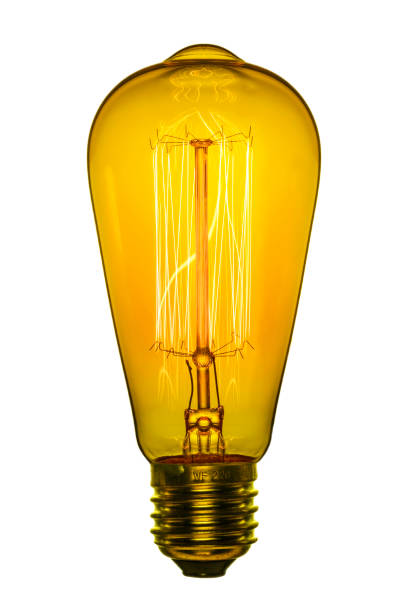 Retro light bulb, Edison style. Isolated object on a white background. Color image. Retro light bulb, Edison style. Isolated object on a white background. Color image. light bulb filament photos stock pictures, royalty-free photos & images