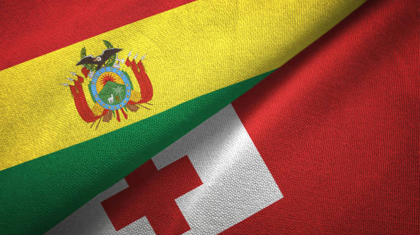 istock Tonga and Bolivia two flags together textile cloth, fabric texture 1124456883