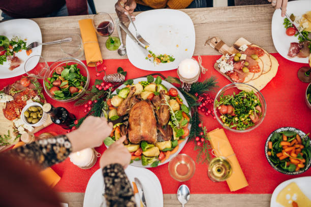 istock Sharing food with friends 1124457918
