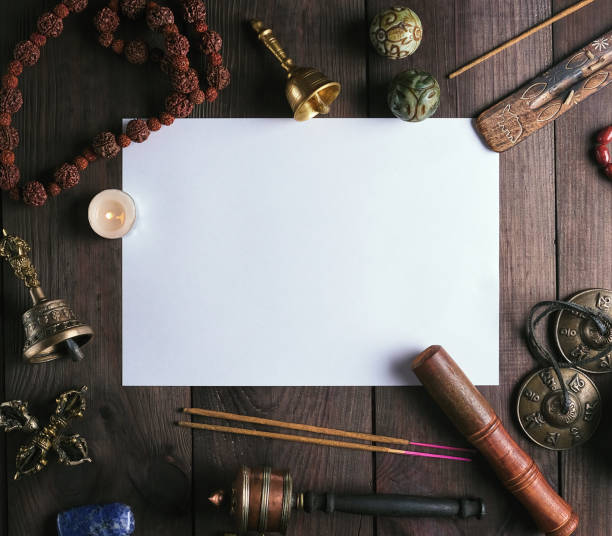 istock blank white sheet in the middle of religious objects for meditation 1124458844