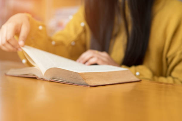 istock Students read books in the library at the university. 1124458967