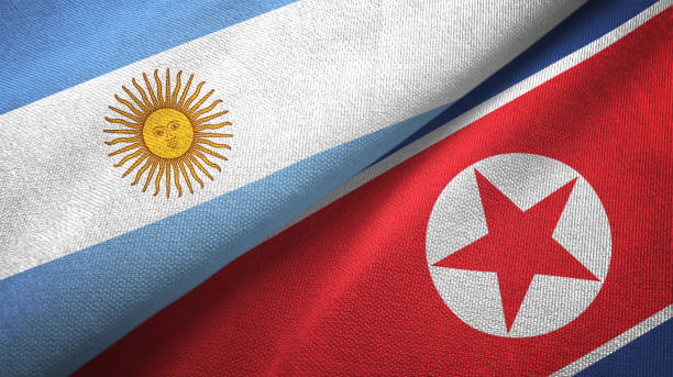 istock North Korea and Argentina two flags together textile cloth, fabric texture 1124463455