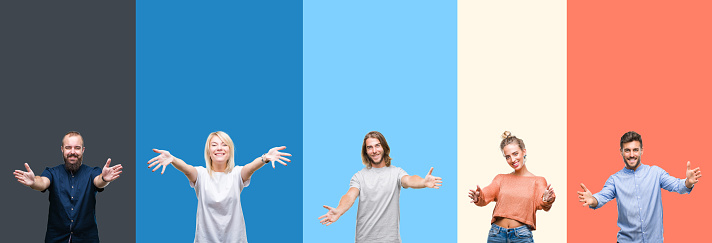 Collage of casual young people over colorful stripes isolated background looking at the camera smiling with open arms for hug. Cheerful expression embracing happiness.