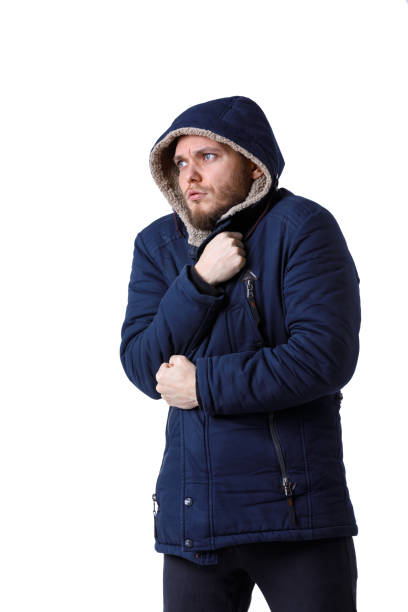 istock Smiling young man in winter warm coat. 1124467995