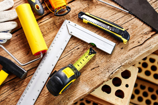 istock set of construction tools on a wooden background top view 1124472558