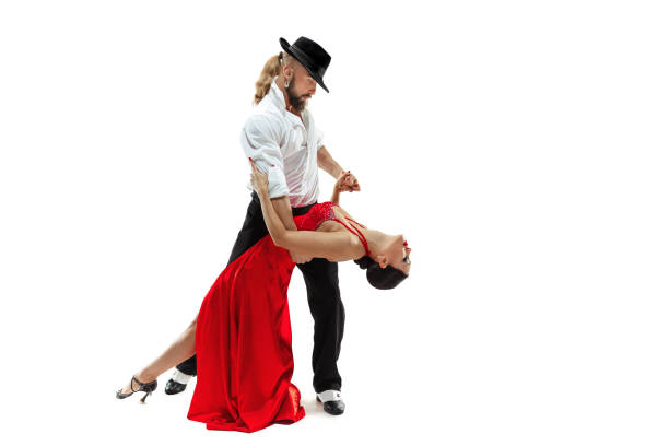 istock Portrait of young elegance tango dancers. Isolated over white background 1124472764