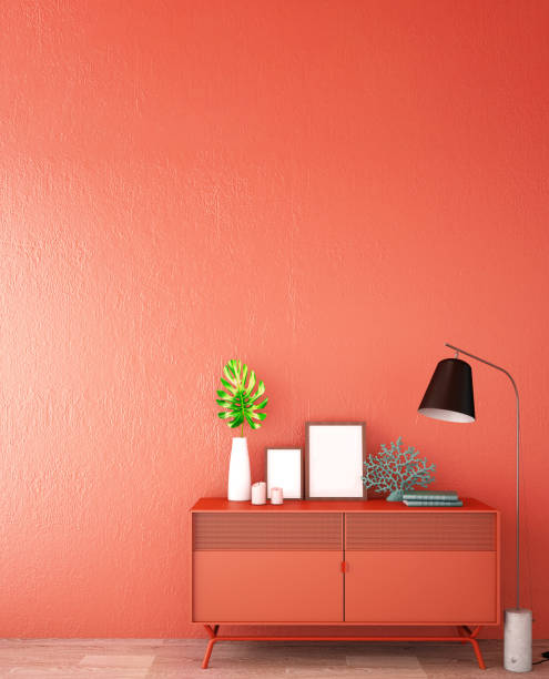 istock interior design for living area or reception with sofa,plant,sidetable,props on wood floor and coral wall in Scandinavian style background / 3d illustration,3d rendering 1124473370
