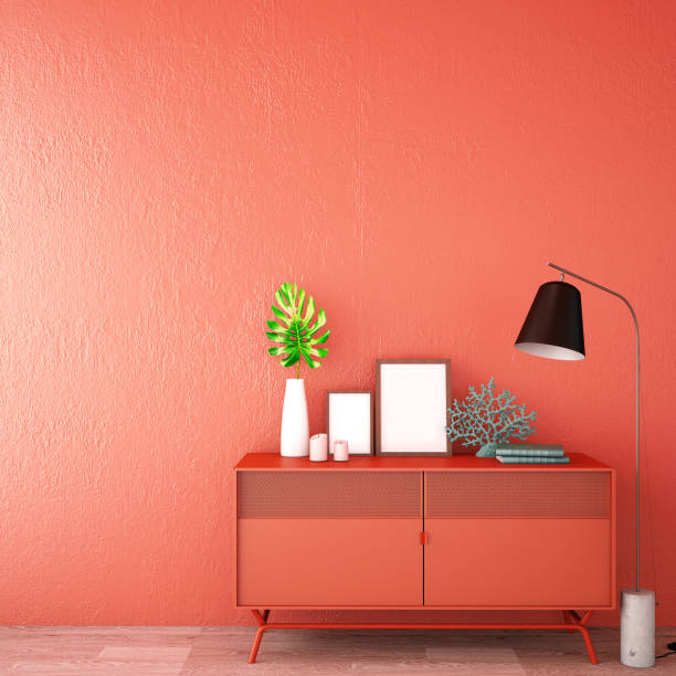 istock interior design for living area or reception with sofa,plant,sidetable,props on wood floor and coral wall in Scandinavian style background / 3d illustration,3d rendering 1124473997