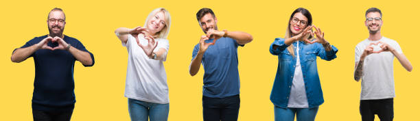 collage of group people, women and men over colorful yellow isolated background smiling in love showing heart symbol and shape with hands. romantic concept. - made man object imagens e fotografias de stock
