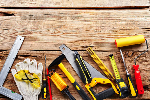 istock set of construction tools on a wooden background top view 1124476835