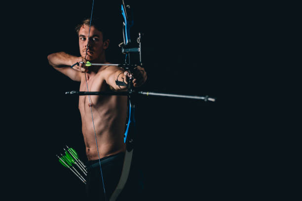 istock Man with the bow and arrow 1124477303