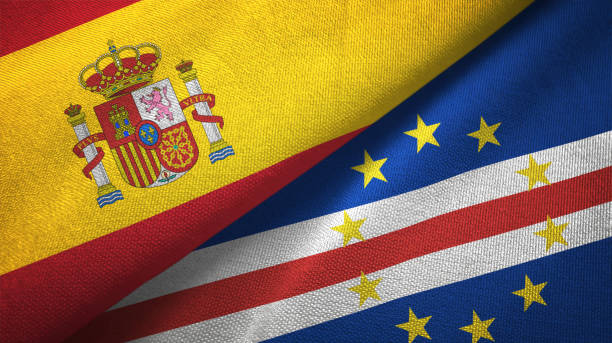 istock Cape Cabo Verde and Spain two flags together textile cloth, fabric texture 1124477464