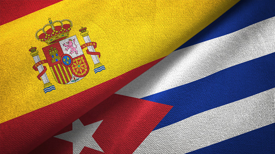Cuba and Spain flags together textile cloth, fabric texture