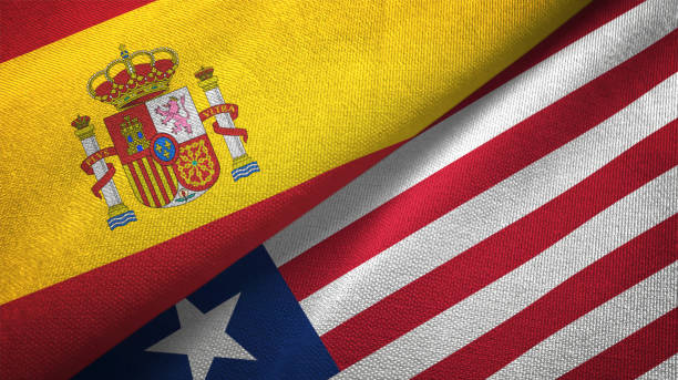 istock Liberia and Spain two flags together textile cloth, fabric texture 1124477759